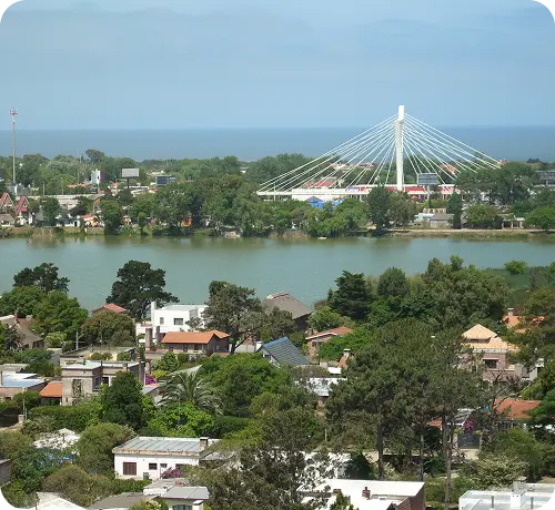 Panoramic view of Ciudad de la Costa with bridge over lagoon